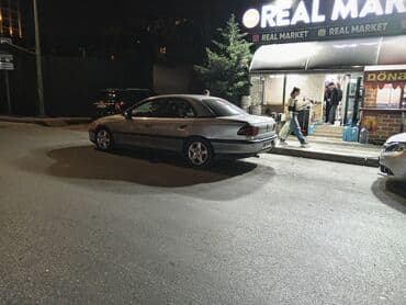 06 sekileri: Opel Omega: 2 l | 1994 il 200000 km Sedan — 5