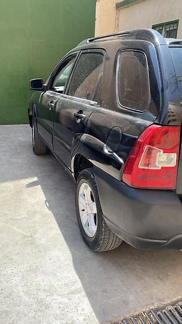 vito disk: Kia Sportage: 2 l | 2008 il Krossover — 5