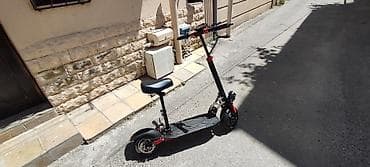 suktur: İşlənmiş Elektrik samokat 10", 751 - 1000 Vt, > 45 km/s — 5