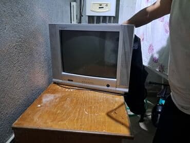 техника видео: Köhnə tip kineskop TV (CRT), gümüşü korpus. Xüsusiyyətlər: - Təxminən — 2