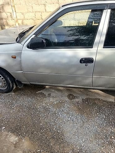 e39 oturacaq: Avtomobil: Daewoo Nexia (sedan), gümüşü rəng Kuzov: 4 qapı, arxa — 9