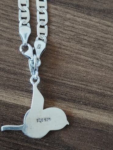 gumuş boyunbagı: Boyunbağı, Gümüş, Ünvandan götürmə — 3