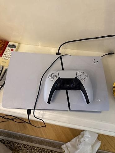 Playstation 5,tam ideal veziyyetde,fifa 25 ve tam original costiki