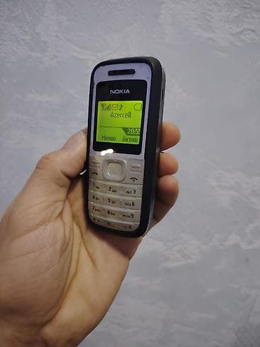 telefon kreditle: Nokia 1202 Orginal Antikvar Telefondur Super isleyir seside eladir — 9