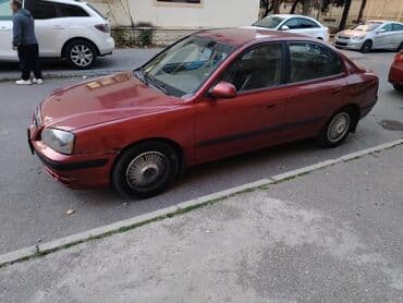 bmw f30 qiyməti: Hyundai Elantra sedan, qırmızı rəng. Arxa hissədə “Elantra” və “GLS” — 1