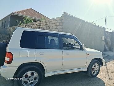 pajero mini: Mitsubishi Pajero iO, ağ rəngli, 5 qapılı kompakt SUV. - Benzinlə — 2