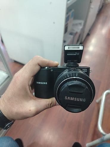 isti: Samsung NX1000 hibrid fotoaparat dəsti - Gövdə: Samsung NX1000 (APS‑C — 7