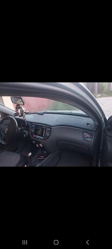 lada priora universal: Kia Rio: 1.5 l | 2007 il Hetçbek — 7