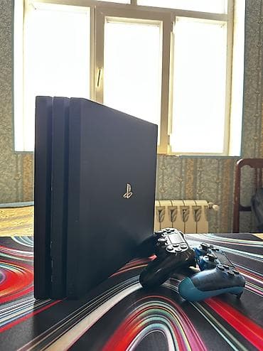 PlayStation 4 Pro (PS4 Pro) oyun konsolu - Rəng: qara - 4K uyğun oyun