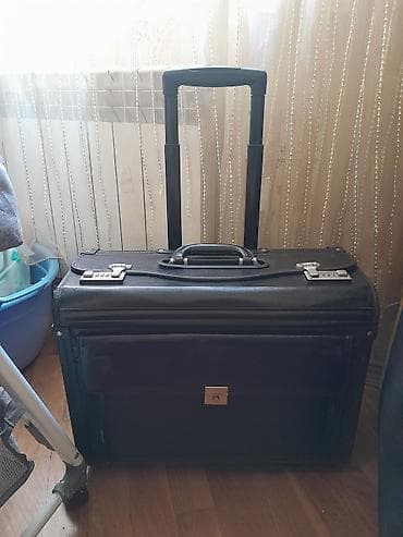 Təkərli sərnişin/iş çamadanı – sərt korpuslu, tutumu geniş model