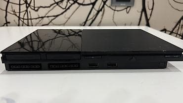 ps2 gta: PlayStation 2 Slim satılır. Tam işlək vəziyyətdədir. Komplektə 2 ədəd — 7