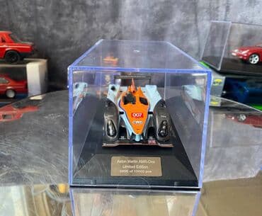 где можно продать марки: Коллекционная модель Aston Martin AMR-One #7 Gulf Team LeMans 2011 — 7
