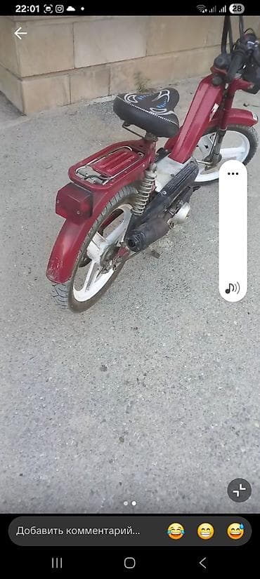 disk qabi: Moped/skuterlə şəhər içi rahat gediş üçün kompakt iki təkərli — 2