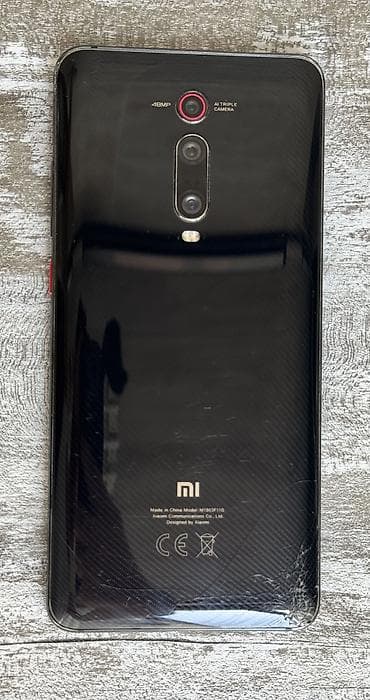 philips xenium 9@9q: Xiaomi Mi 9T Pro, 128 GB, rəng - Qara, 
 Barmaq izi, İki sim kartlı, Face ID — 2