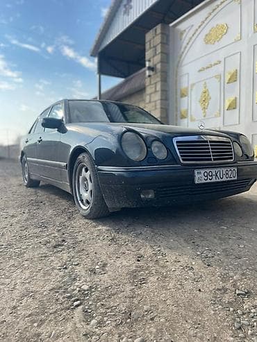 cobalt bar: Mercedes-Benz E-Class: 2.8 l | 1998 il Sedan — 7