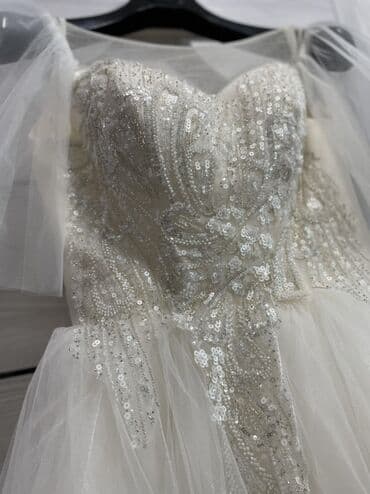 nişan donları instagram: Gəlinlik – zərif tüllü və payetli - Rəng: süd ağ - Model: A-line/bal — 1