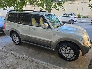 mitsubishi eclipse: Mitsubishi Pajero (3-cü nəsil) 5 qapı SUV - Rəng: ağ/mirvari - — 1