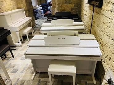 qədimi pullar: Koreya istehsali olan dünya şöhrətli Kurzweil pianoları. Sevimli — 1