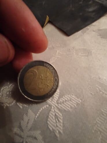 1000 rubul nece manatdir: Məhsul: 2 avro sikkəsi – Almaniya Təsvir: - Nominal: 2 EUR - Ölkə — 1