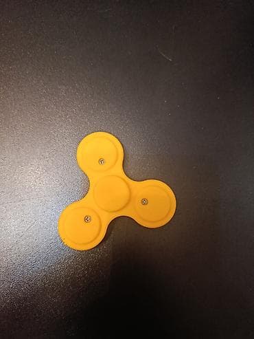 Uşaq dünyası: Sarı fidget spiner (3 qanadlı) - Material: yumşaq silikon örtüklü — 2