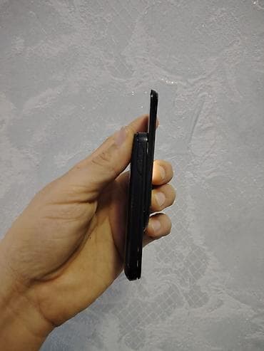 a12 telefonu: Nokia 8000 4G, 1 TB, rəng - Qara, Düyməli, Barmaq izi, İki sim kartlı — 4