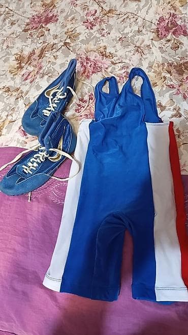 Мужская одежда: Məhsul: Güləş maykası (singlet) və güləş ayaqqabıları dəsti . İkisi — 2