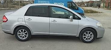 amortizator satisi: Nissan Tiida: 1.5 l | 2011 il Sedan — 3