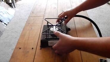 gitara balaca: Turist Qaz Plitesi shlanqla qoshulan balaca plitedir balon — 2