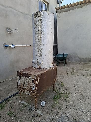 Metall soba və böyük həcmli su qızdırıcı (samovar tipli qazan)