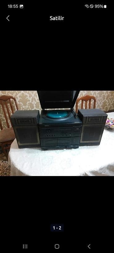 android box tv: Vinil pikaplı musiqi mərkəzi - Üst hissədə qapaqlı vinil pikap (disk — 1
