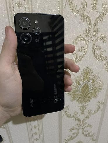 Видеоигры и приставки: Redmi 12, 256 ГБ, цвет - Черный, Отпечаток пальца, Face ID — 2