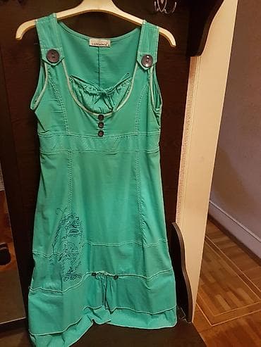 giyim: Sarafan. Türkiyə istehsalı. Ölçüsü - 44. Rəngi - firuzəyi. Qiyməti - — 2