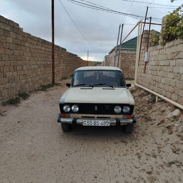 тап аз автомобили: VAZ 2106 sedan - Kuzov: bej rəng, 4 qapı, xrom yan moldinqlər — 4