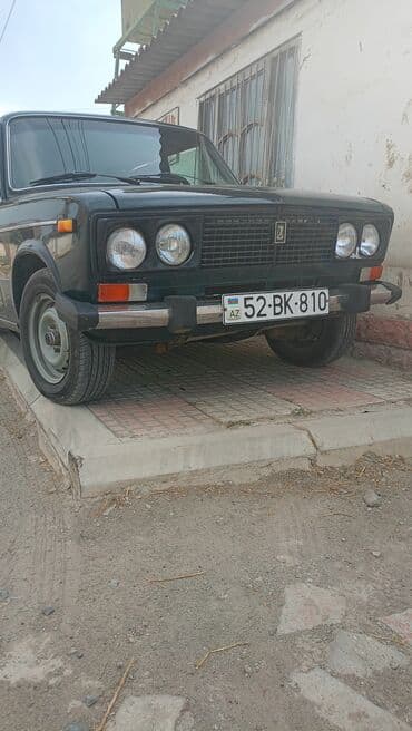 07 sekilleri cekmek: VAZ 2106 sedan - Kuzov: 4 qapılı sedan, tünd yaşıl rəng - Ön hissə — 1