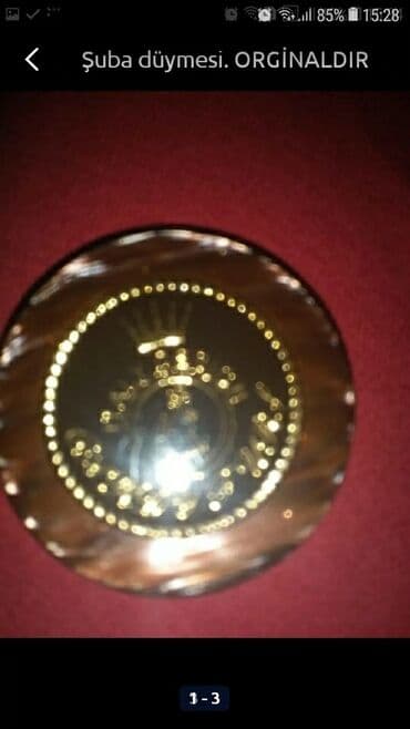 Tam teze şubanın ilk esas düymesi.Kimin şubasında düyme itibse