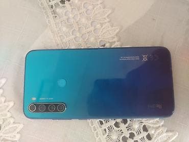 телефон fly selfie 1: Smartfon – mavi gövdə, damla formalı ön kamera kəsiyi olan tam ekranlı — 5