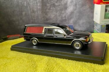 metbex tavan modelleri: Коллекционная модель Mercedes-Benz 200 W123 Hearse black 1982 Schuco — 23
