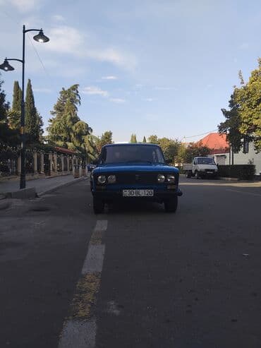 opel vectra b suret qutusu: VAZ 2106 sedan – mavi rəngdə, 4 qapı, klassik kuzov. Xüsusiyyətlər — 1