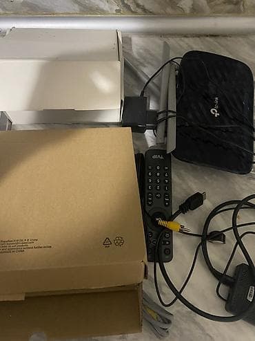 internet modem qiymetleri: TP-Link Wi‑Fi router və IPTV set-top box komplekti Tərkib: - TP-Link — 2