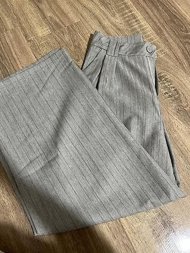 zara salvar: Ağ-qara zolaqlı, geniş balaqlı qadın şalvarı. Bu şalvar yüksək bel — 1