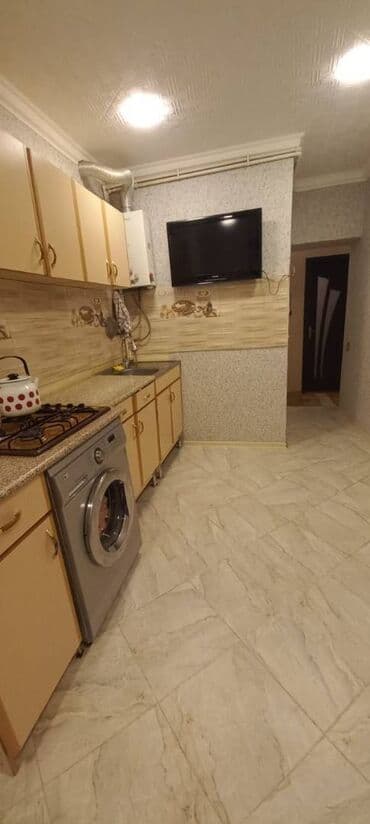 qubada kirayə ev: Sabunçu rayonu,Razin,Arzu şadlıq evi yaxınlığı,5 mərtəbəli — 5