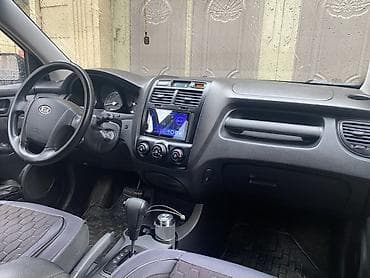Kia: Kia Sportage: 2 л | 2007 г. Кроссовер — 5