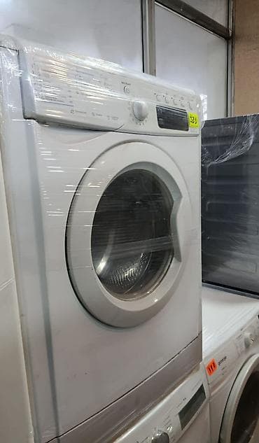 Paltaryuyan maşın – ön yükləməli, ağ rəng. - Ön paneldə proqram seçimi