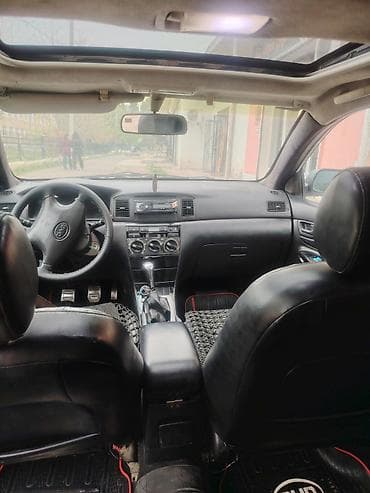 radiator masin: BYD F3 sedan – ağ rəngli, 4 qapı, ön-arkalı tam ölçülü salon. Xarici — 5