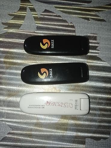 oteeto tab 16: Salam. Şəkillərdə görünən 3 ədəd köhnə nəsil USB modemi hamısı bir — 1