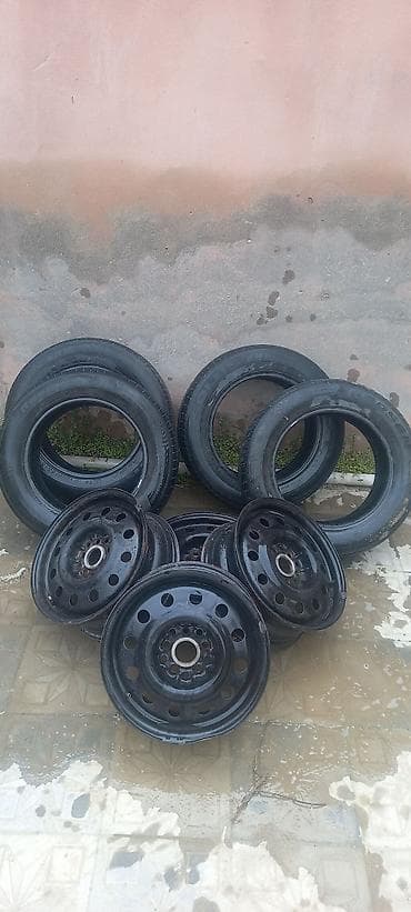 Tayota pryusun usden cixib disk teker bir yerde satilir kolcsalarida