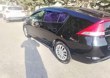 Honda Insight hibrid hetçbek satilir. Ili 2009.Mator 1.5 hibrid. - — 5