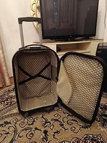 islenmis camadan: Səyahət çamadanı – orta ölçü, təkərli və teleskopik tutacaqlı — 2