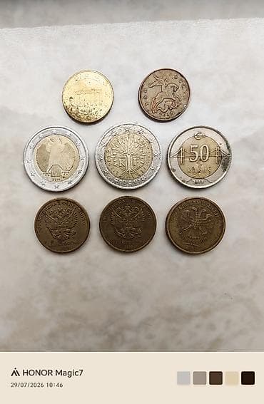 saatlar type 1: 2001ci ilə aid 2EURO və 2002ci ilə aid 10EURO CENT 50kuruş(Türk — 2