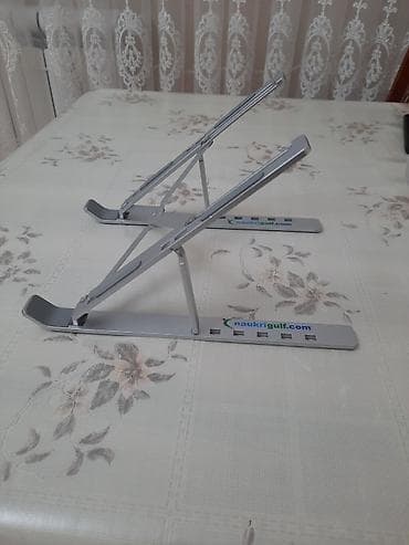 for x: Məhsul: Laptop Stand – Creative Folding Storage Bracket salam əziz — 4